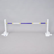 LarDen Hobby Horse Jump with a blue, white and yellow pole on two low white stands with height marks from 30 to 50 cm