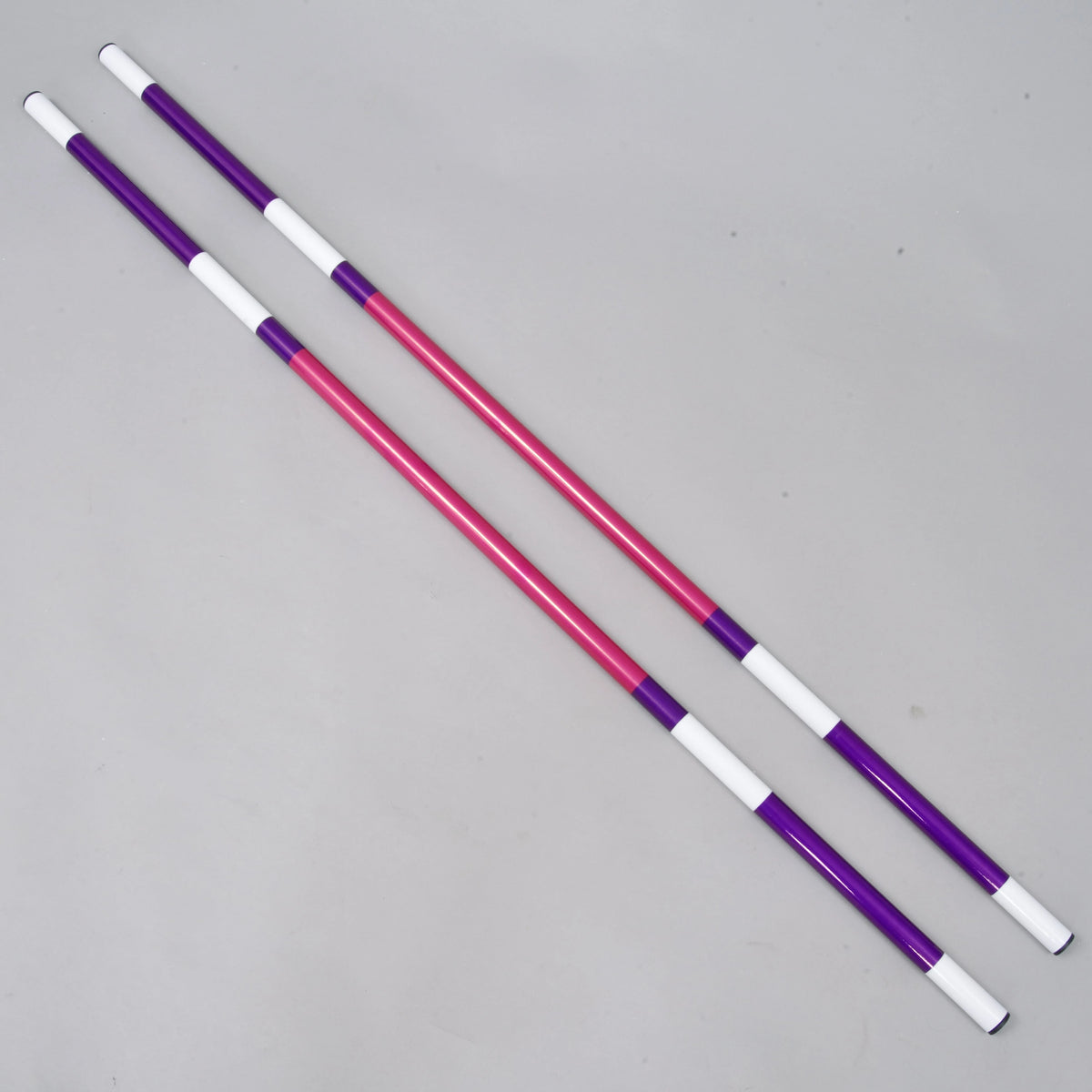 LarDen springpaal roze-paars 2 stuks voor Hobby Horse: twee paars, roze en wit gestreepte palen naast elkaar