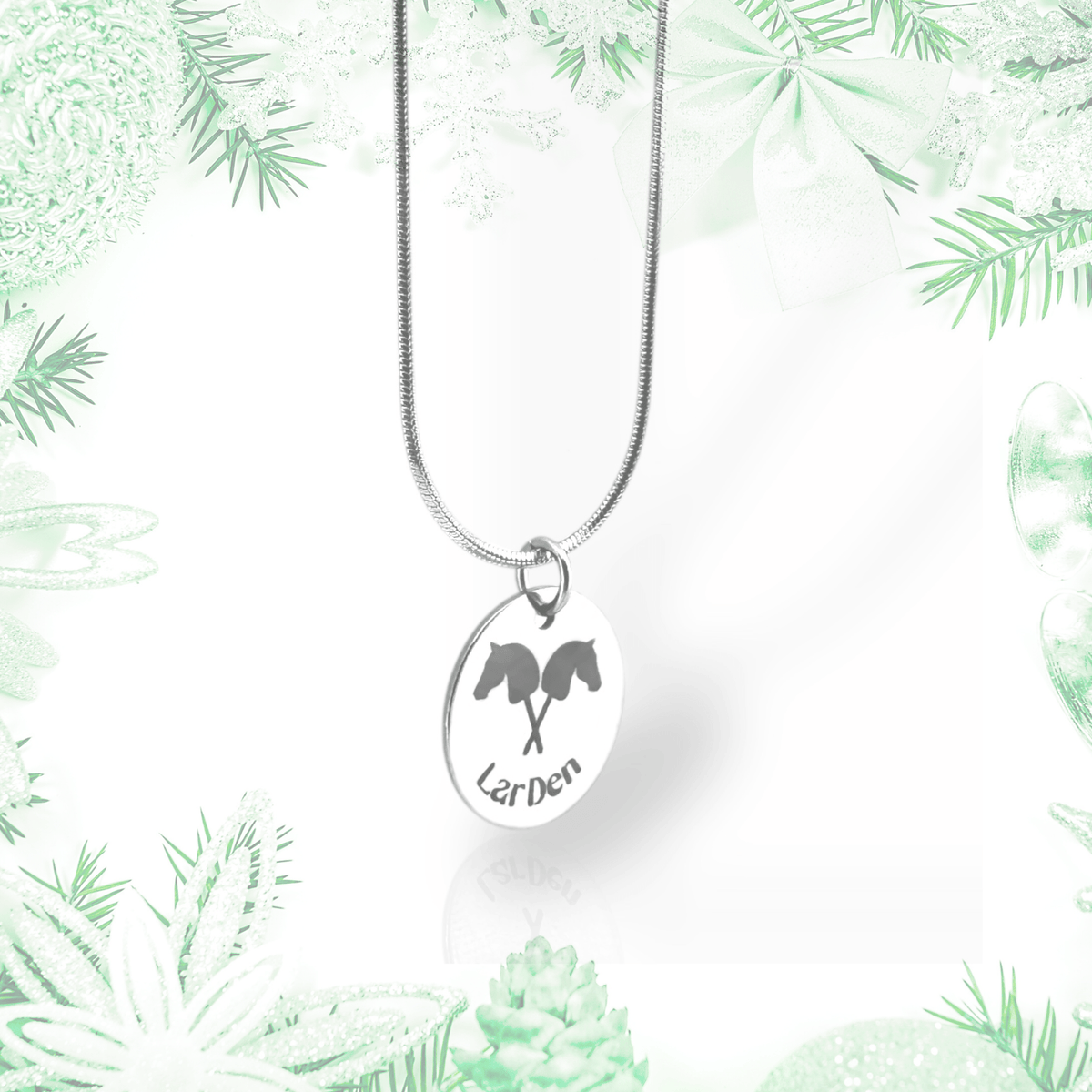 Necklace with Hobby Horse pendant made of surgical stainless steel, engraved with crossed horse heads and LarDen
