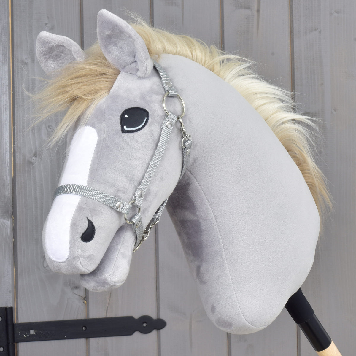Grey Hobby Horse with a blond mane and white blaze wearing only the grey webbing halter from the Set Start Silver