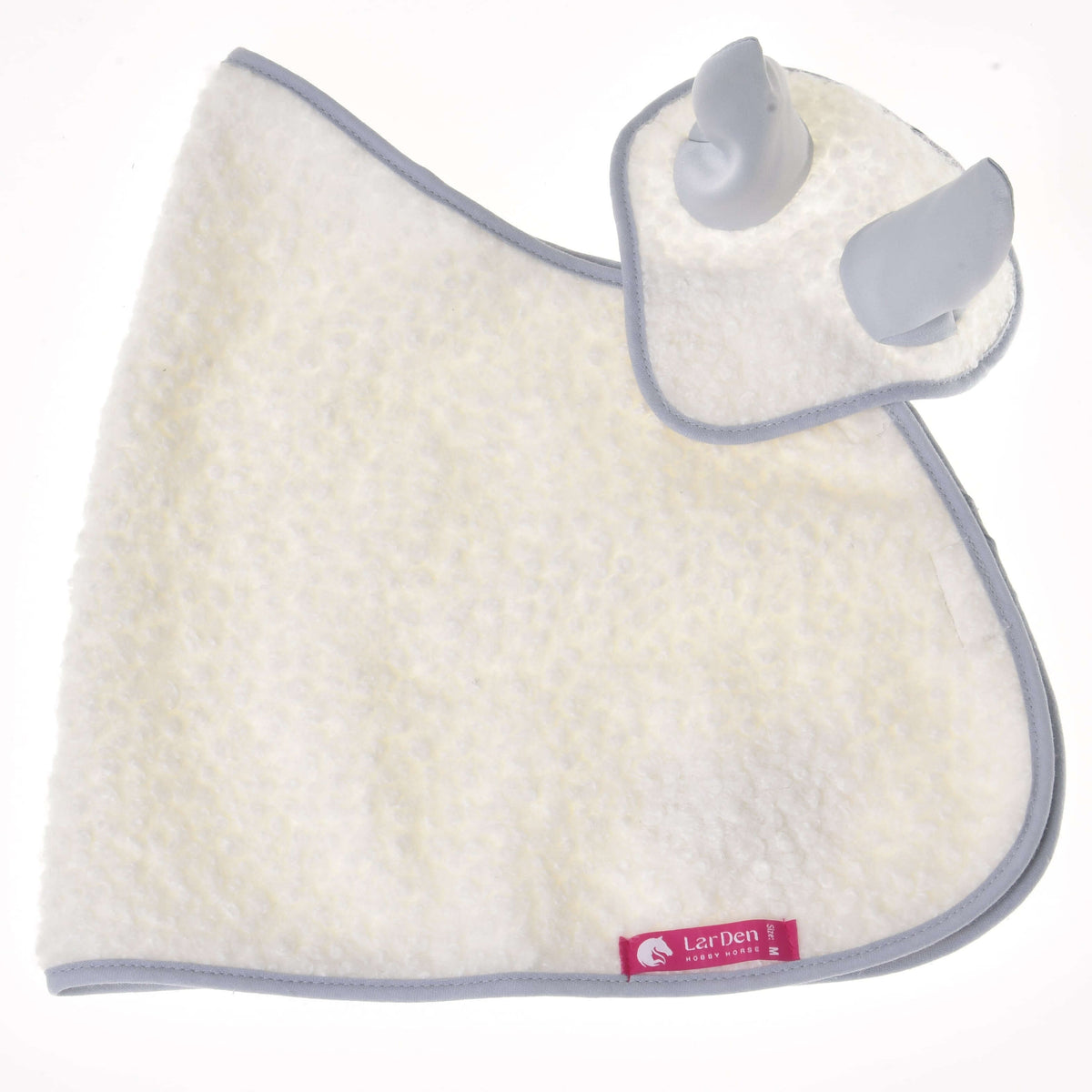 Hobby Horse Set Snowflake blanket and ear bonnet on white, with the pink LarDen label on the cream fleece edge