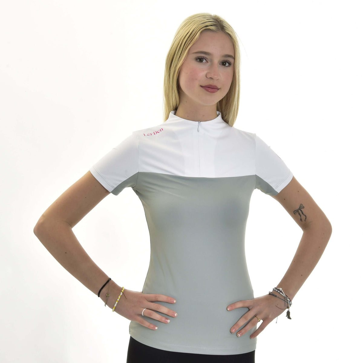 Hobby Horse T-Shirt LarDen Premium worn by a blonde girl, white yoke and light grey body with a short zip at the collar