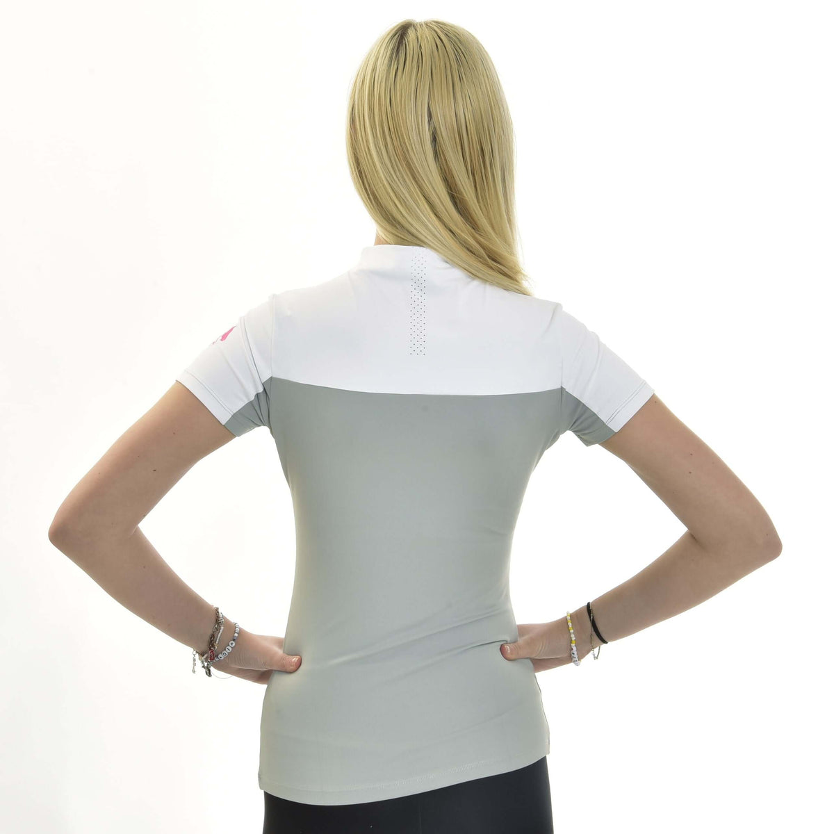 Blonde girl from behind with hands on hips in the white and grey Hobby Horse T-Shirt Premium, a perforated strip at the neck