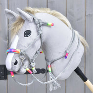 Grey Hobby Horse wearing Rope set Manhattan: grey rope halter with a rainbow noseband, reins and a neck ring with tassel
