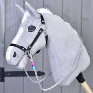Grey plush Hobby Horse with a black halter and grey Manhattan rope reins with a rainbow wrap at the clip