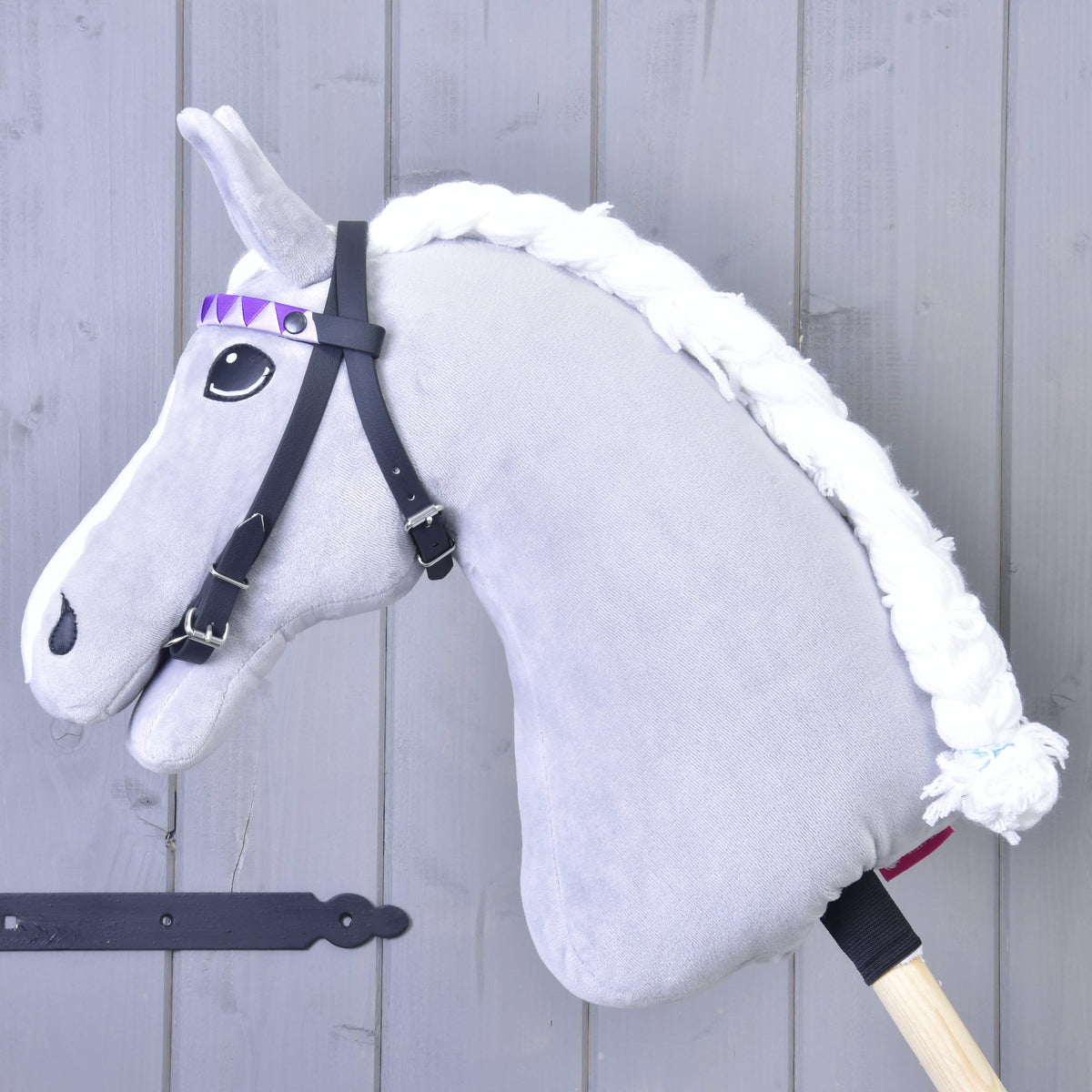 Bridle with 2 headbands purple by LarDen on a grey Hobby Horse, with a purple triangle-pattern browband