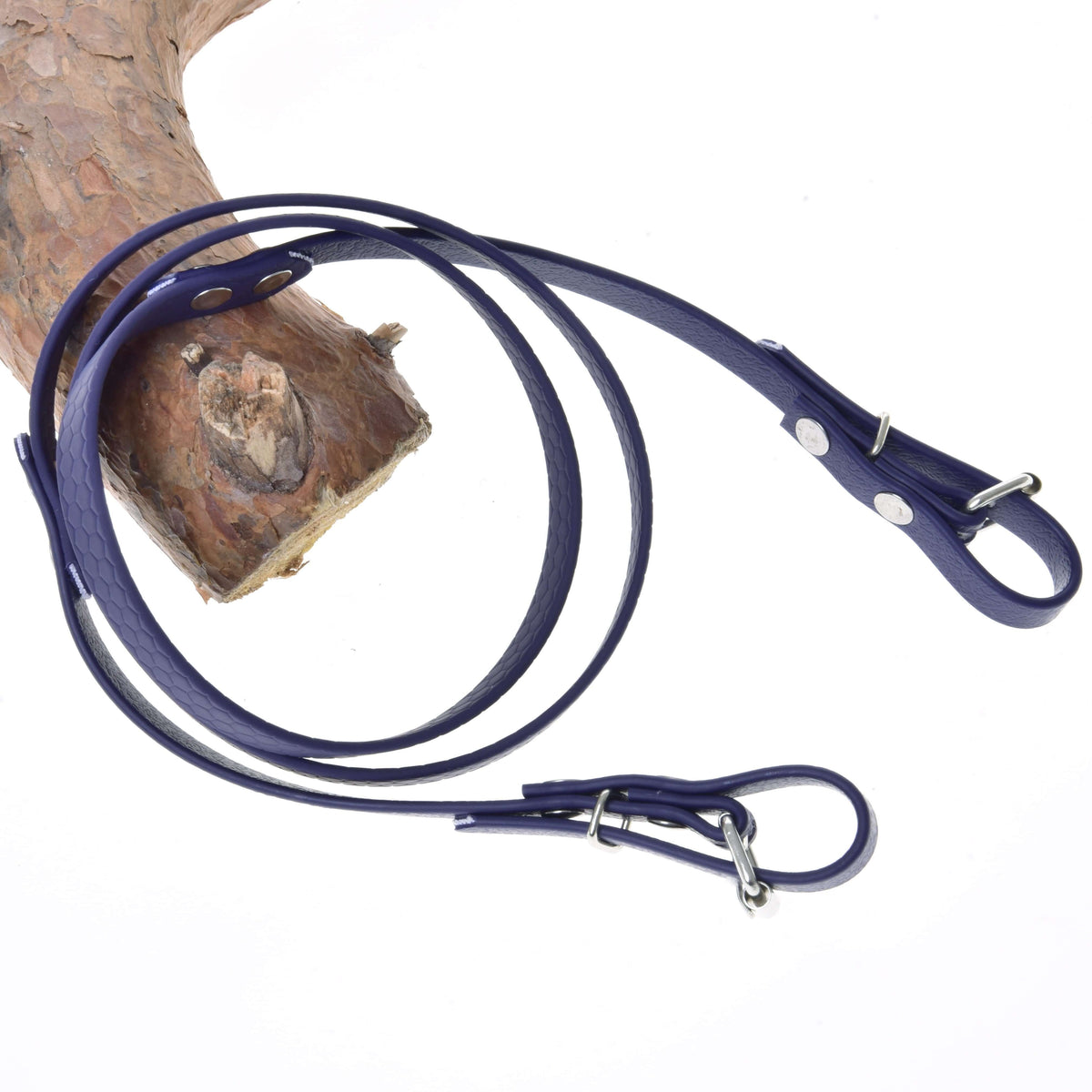 Hobby Horse Reins rubberized Dark purple by LarDen, deep violet reins with buckle ends looped over a pine branch