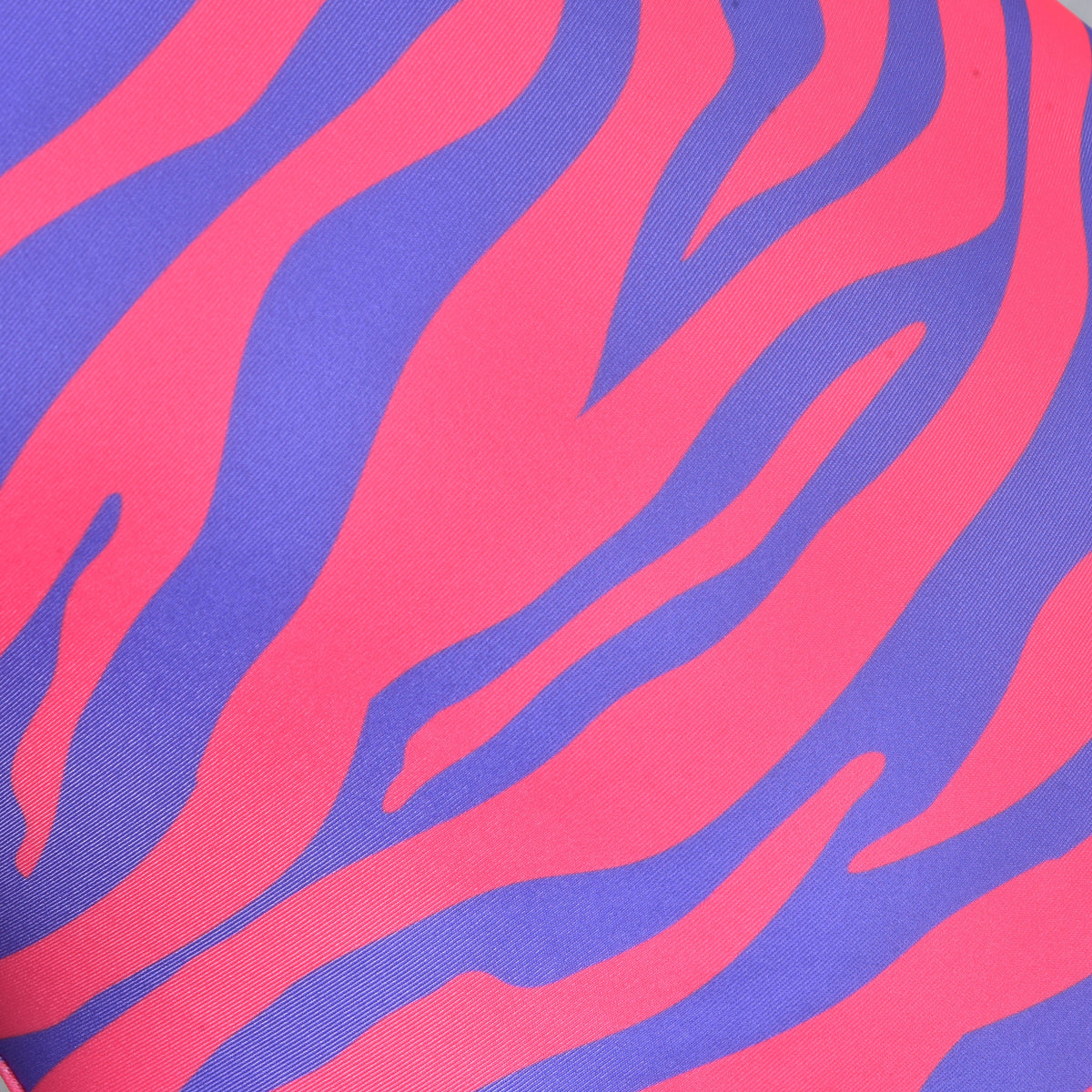 Detail of the pink and purple zebra stripes on the smooth stretch fabric of the Hobby Horse protective suit Fancy
