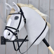 Hobby Horse Complete De Luxe bridle with 2 browbands by LarDen on a grey plush head, with rhinestone browband and reins