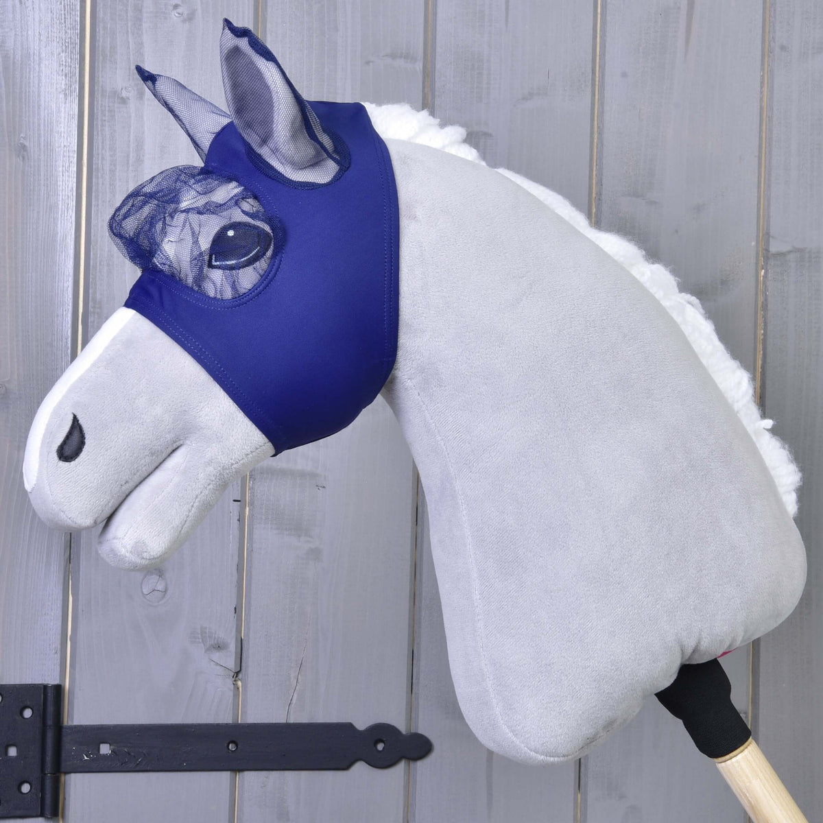 Hobby Horse Fly Mask LarDen on a grey plush head, royal blue stretch fabric with navy net over the eyes and ears