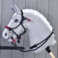 Grey Hobby Horse with a white braided mane wearing the Rope set Maroon, a black rope halter and reins with maroon wraps