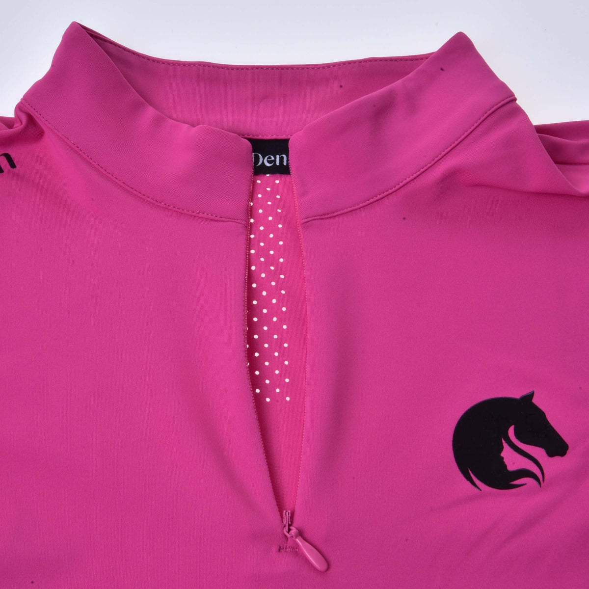 Close-up of the stand-up collar of the pink Hobby Horse T-Shirt, zip open over a perforated placket, black horse logo