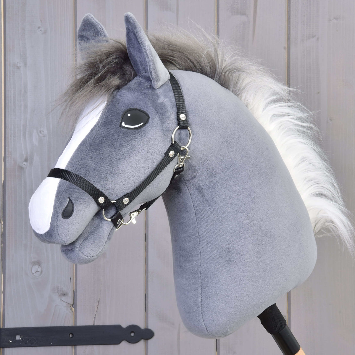 Hobby Horse Beauty with Black Halter by LarDen, a dark grey plush head with a white blaze and a grey-to-white fur mane