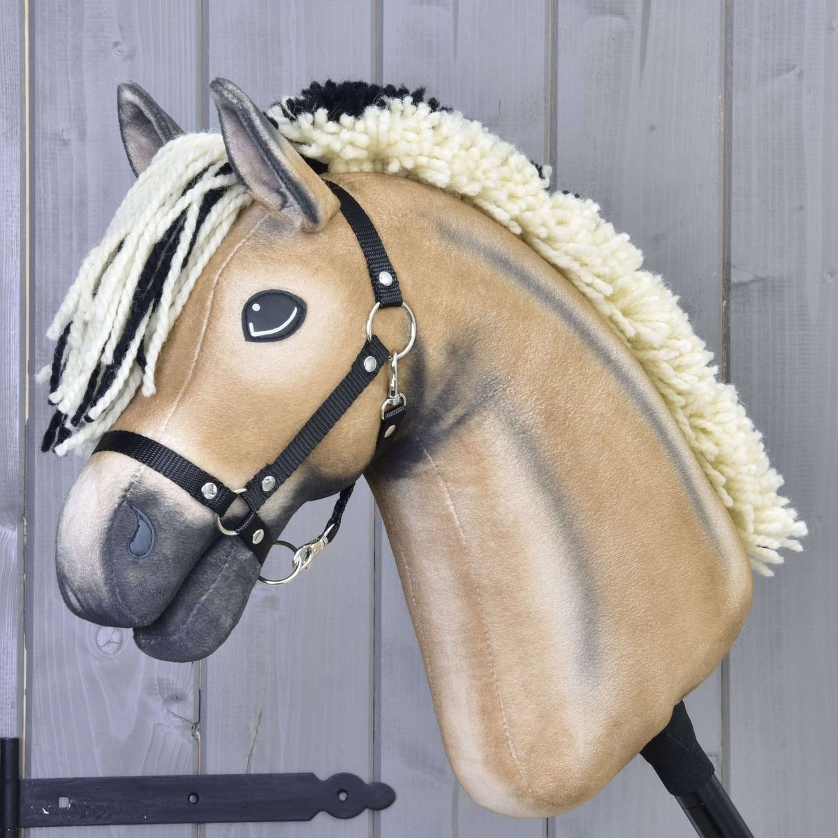 Hobby Horse Colby with black Halter by LarDen, a dun plush head with a cream and black mane and dark grey muzzle