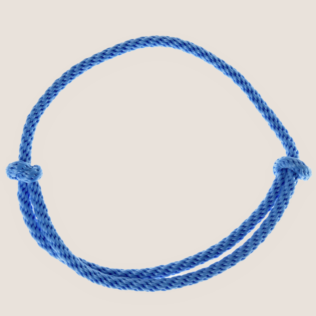 Cordeo Sky on a beige background, the blue rope loop with a knot on each side and a doubled lower strand