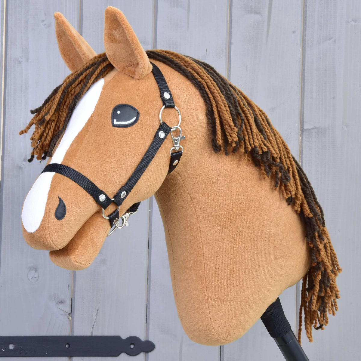 Hobby Horse Edward with Black Halter by LarDen, a chestnut plush head with a white blaze and two-tone brown yarn mane