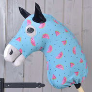 Hobby Horse protective suit Melon (Lycra) by LarDen, light blue with smiling watermelon slices, pulled over a grey head