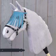 Grey plush Hobby Horse with a white mane wearing the black halter, turquoise fringes hanging over its eyes