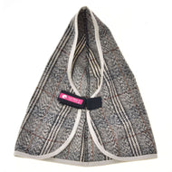 Stable Blanket Fine Check from the front, opened to show the chest strap with a pink LarDen label and beige binding