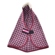 Front view of the houndstooth stable blanket with burgundy binding and its chest strap with the pink LarDen label