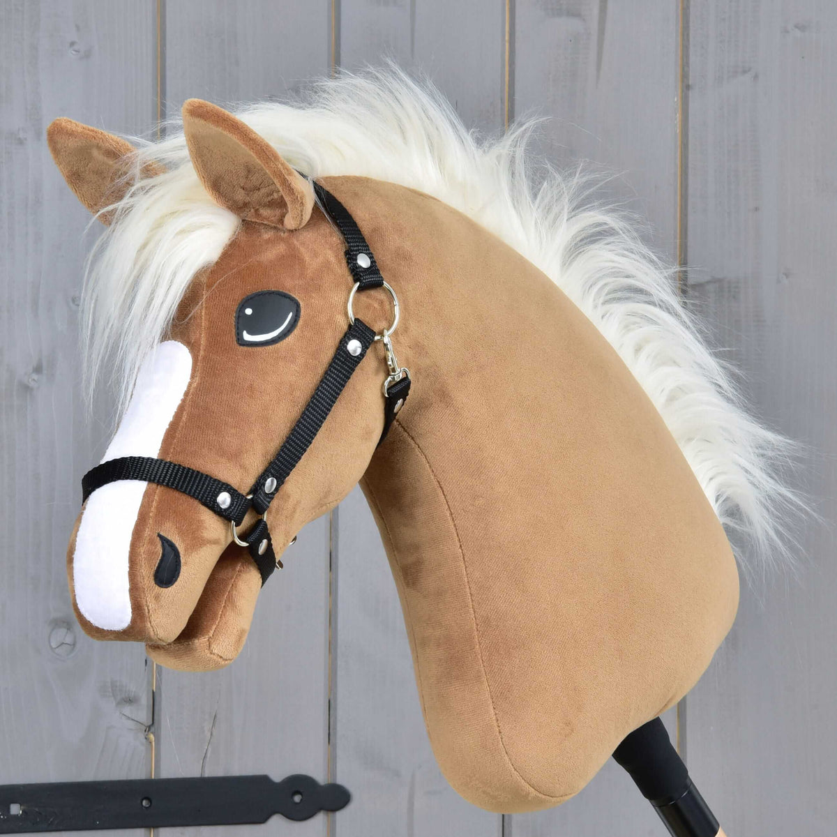 Hobby Horse Star with black halter by LarDen, a caramel plush head with a long white faux fur mane and a white blaze