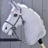 Grey plush Hobby Horse wearing the Complete leatherette bridle grey with pink headband by LarDen, with pale pink reins